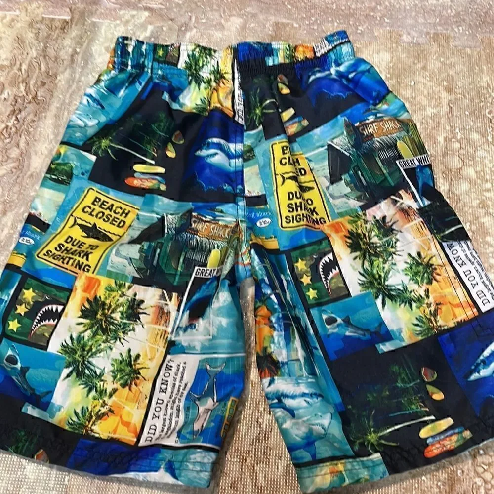 OP boys, shark print swim trunks.Size 8.